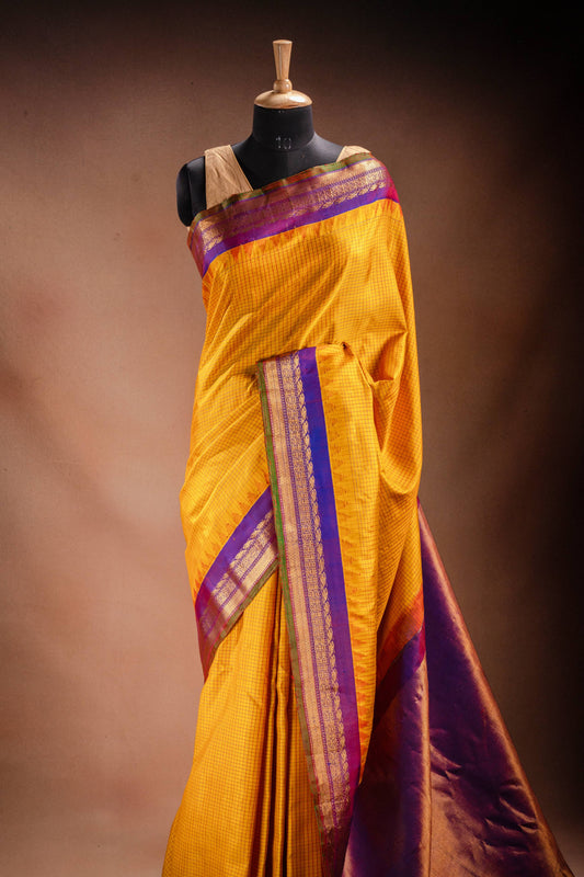 Gadwal Silk Yellow with Purple Border Saree