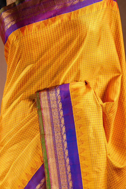 Gadwal Silk Yellow with Purple Border Saree