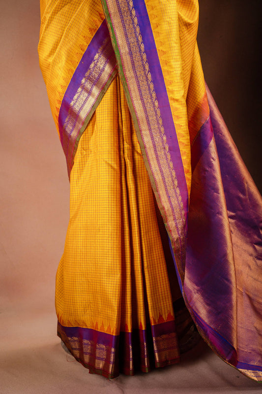 Gadwal Silk Yellow with Purple Border Saree