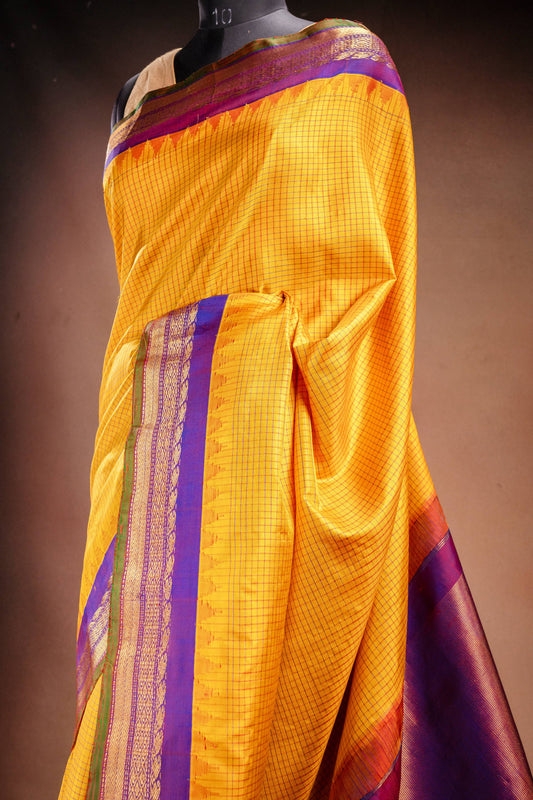 Gadwal Silk Yellow with Purple Border Saree