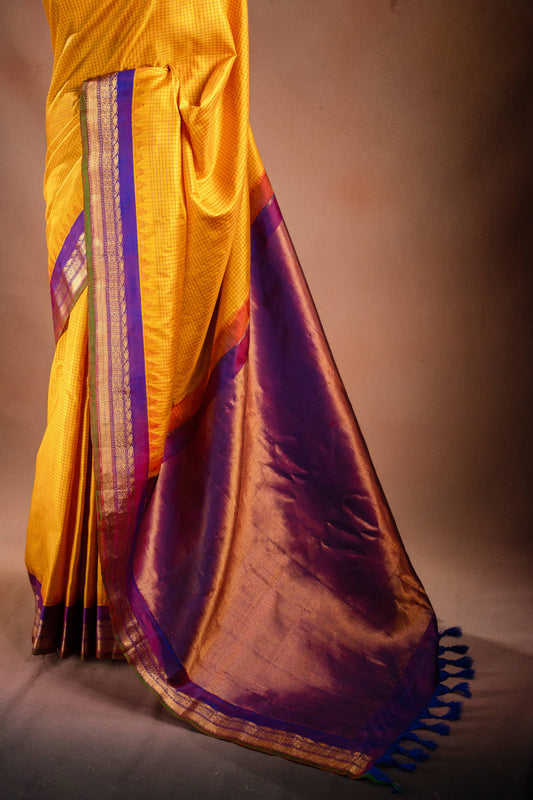 Gadwal Silk Yellow with Purple Border Saree