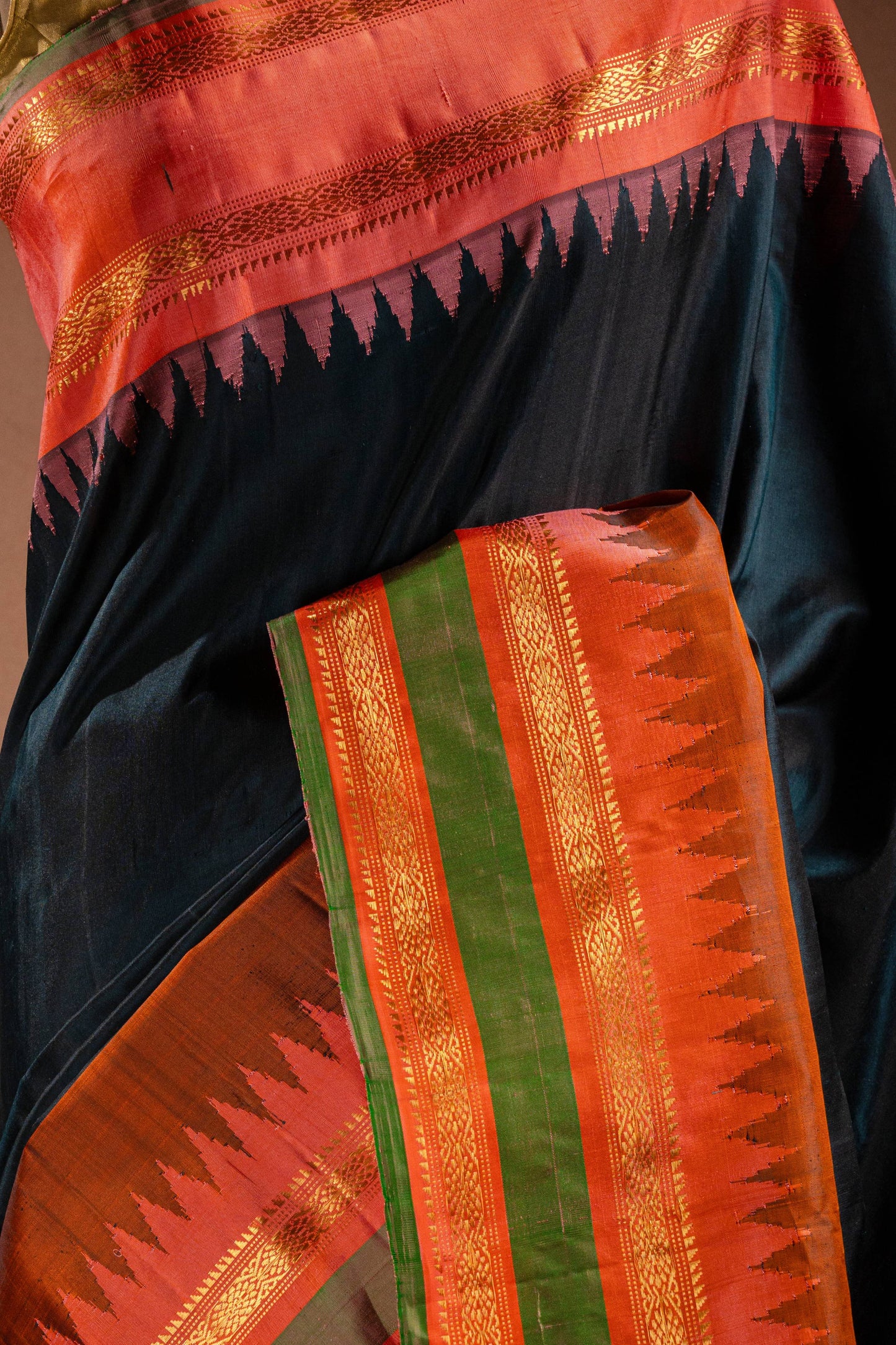Gadwal Silk Black with Orange Border Saree