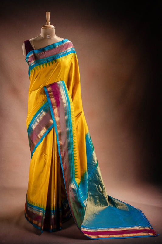 Gadwal Silk Yellow with Blue Border Saree