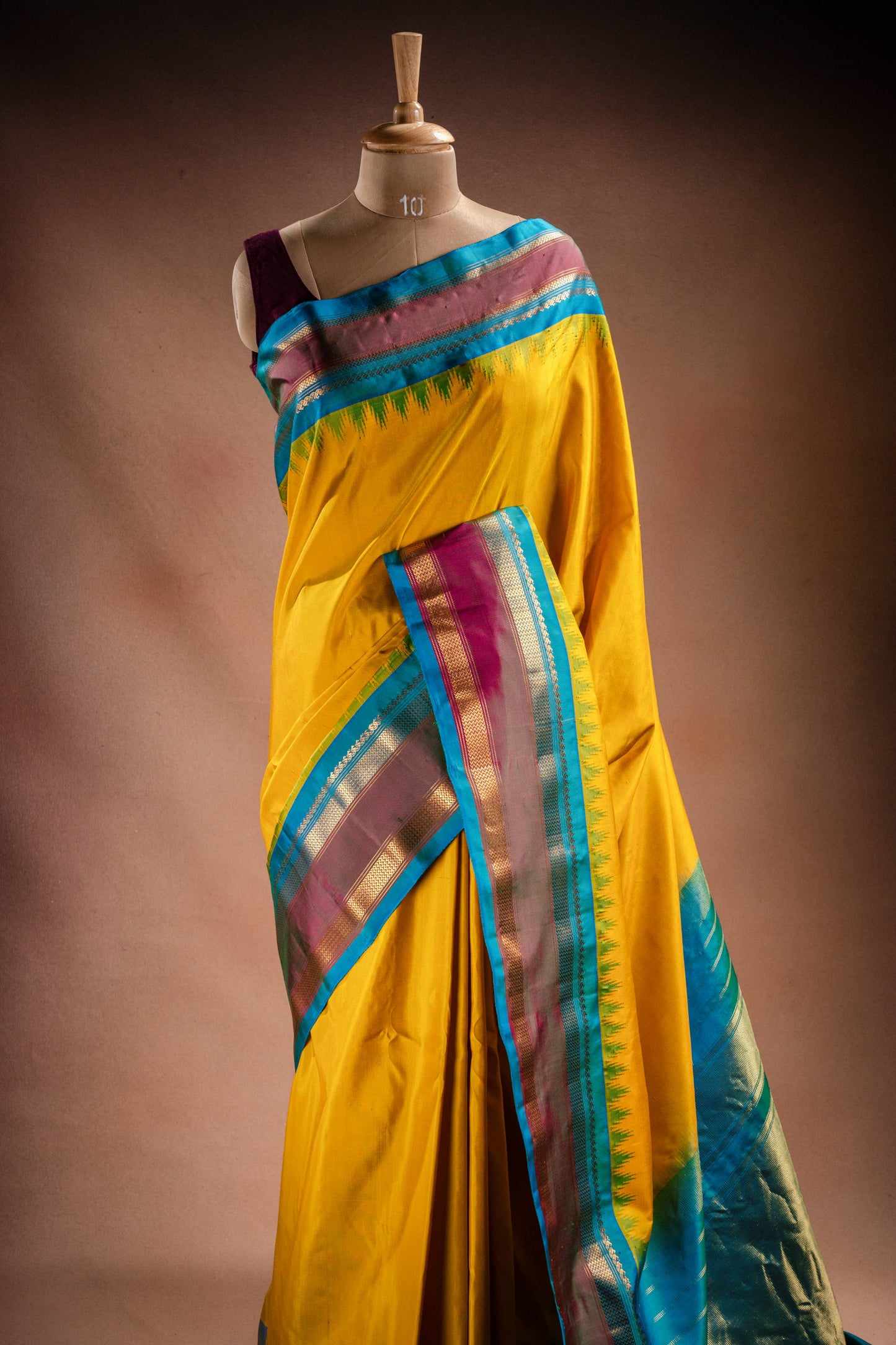 Gadwal Silk Yellow with Blue Border Saree