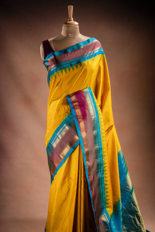 Gadwal Silk Yellow with Blue Border Saree