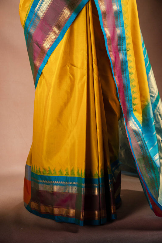 Gadwal Silk Yellow with Blue Border Saree