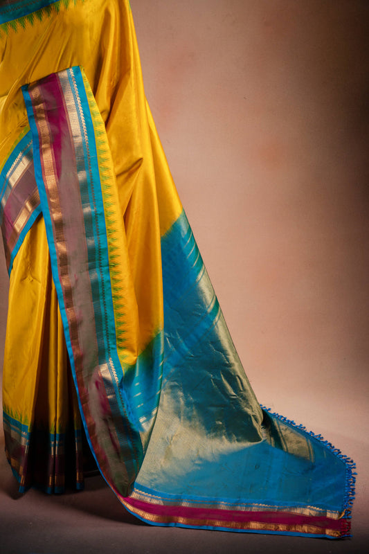 Gadwal Silk Yellow with Blue Border Saree