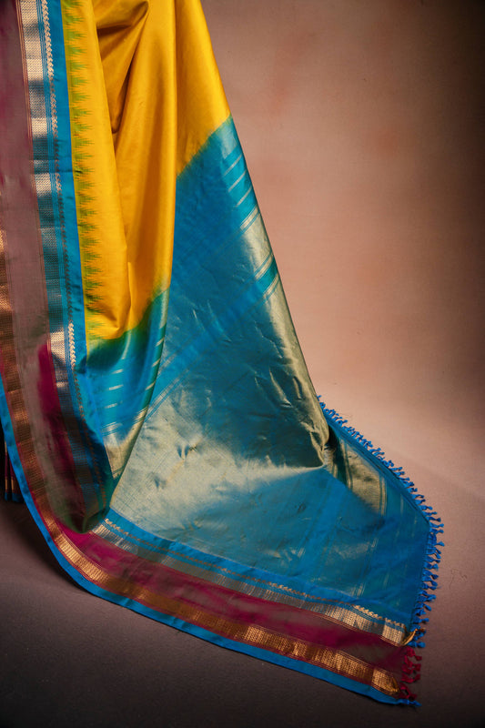 Gadwal Silk Yellow with Blue Border Saree
