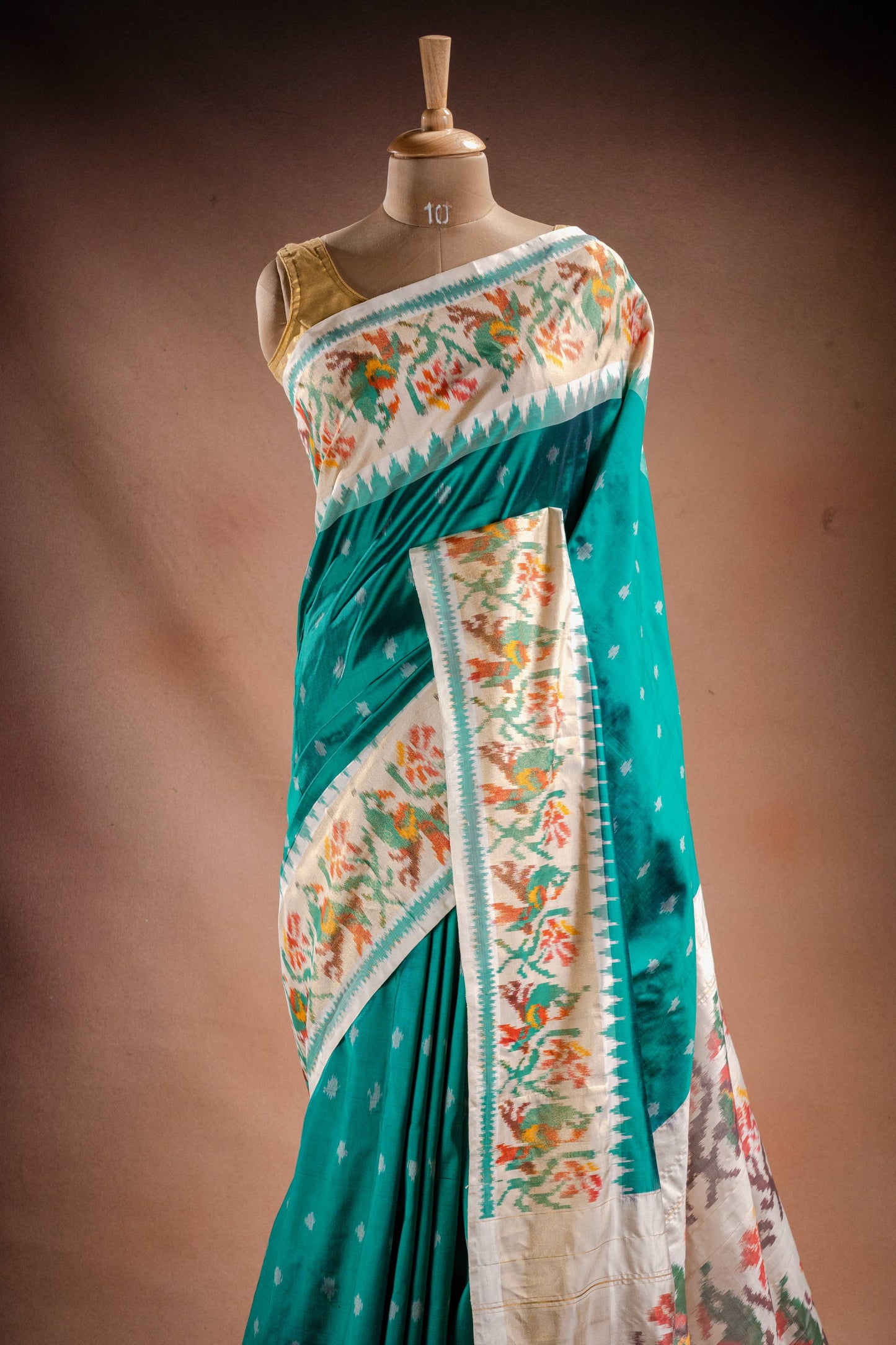Teal Pochampally Saree with White Border