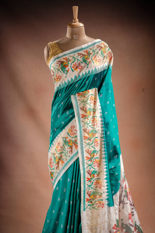 Teal Pochampally Saree with White Border
