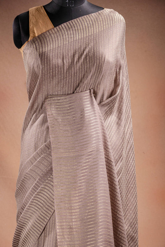 Beige Crepe Silk Saree with Silver Stripes