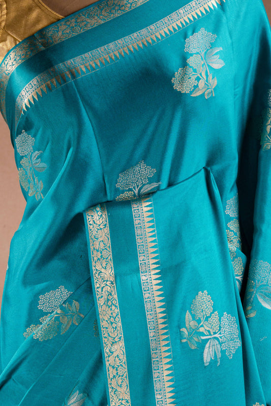 Teal Blue Crepe Silk Saree with Double Mispick Zari Roses