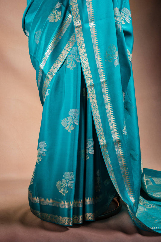 Teal Blue Crepe Silk Saree with Double Mispick Zari Roses