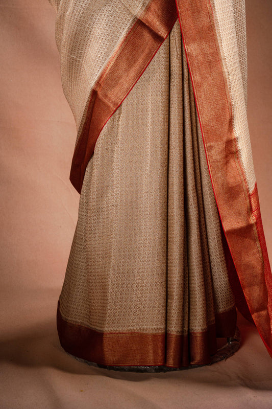 Beige Crepe Silk Saree with Red Border and Pallu