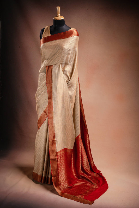 Beige Crepe Silk Saree with Red Border and Pallu