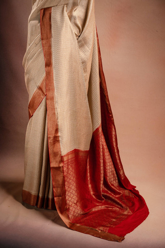 Beige Crepe Silk Saree with Red Border and Pallu