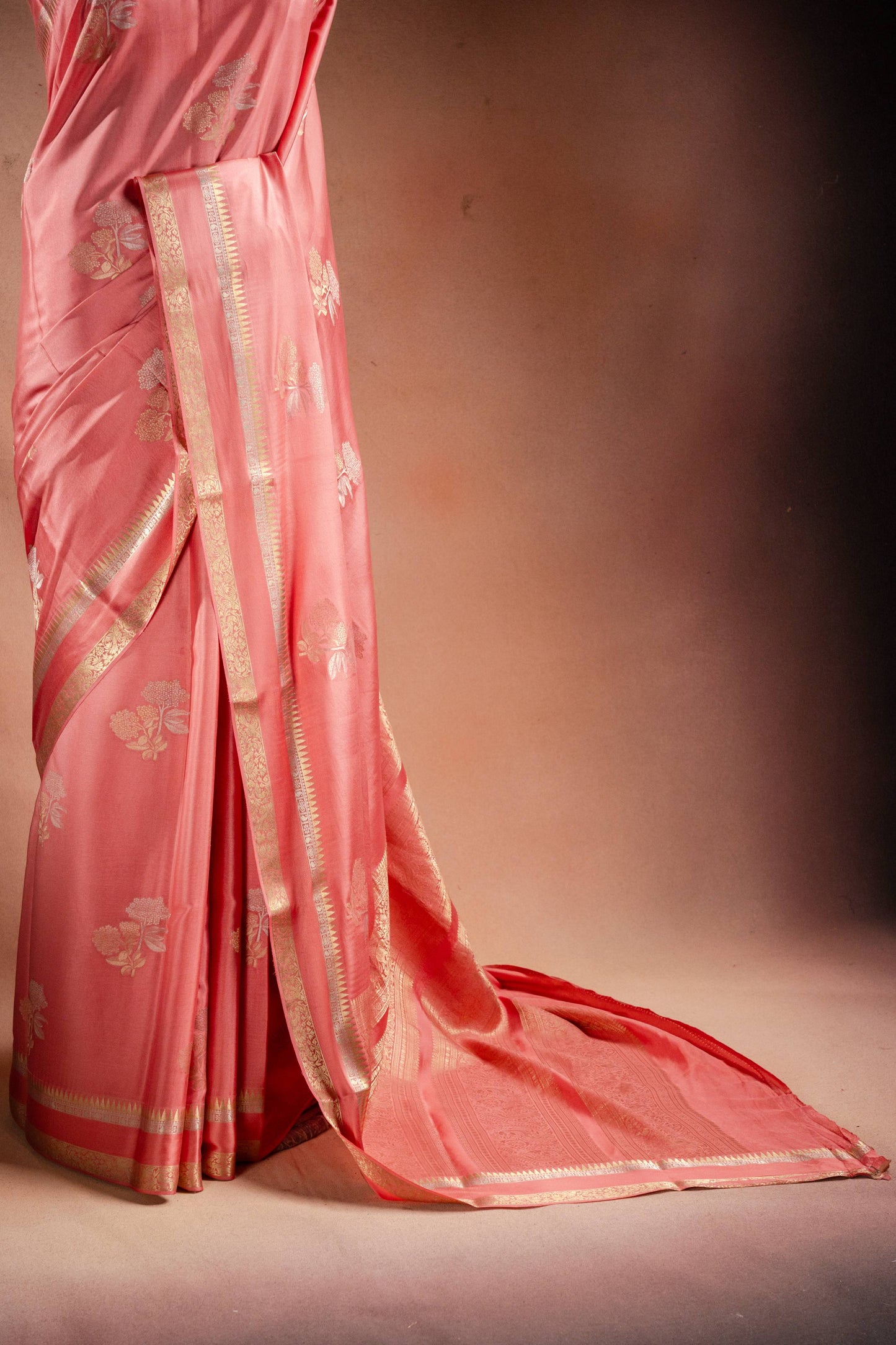 Peach Crepe Silk Saree with Double Mispick Zari Roses