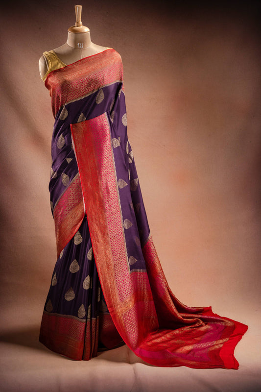 Purple Crepe Silk Saree with Pink-Red Contrast Border and Zari Buttas