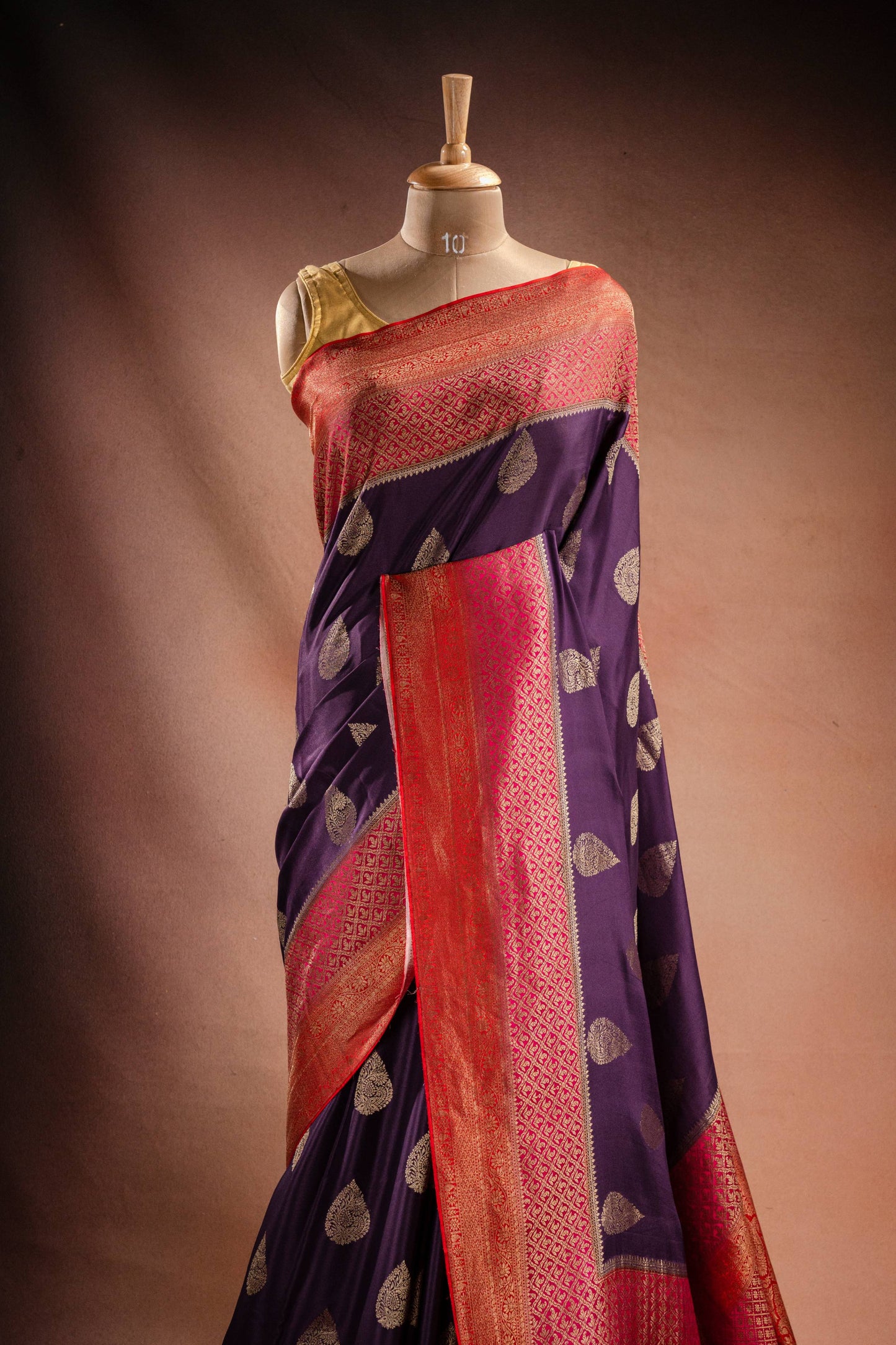 Purple Crepe Silk Saree with Pink-Red Contrast Border and Zari Buttas