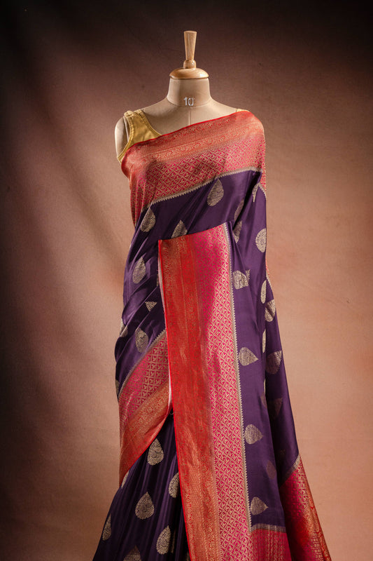 Purple Crepe Silk Saree with Pink-Red Contrast Border and Zari Buttas