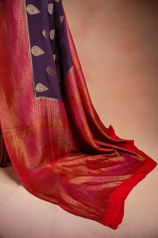 Purple Crepe Silk Saree with Pink-Red Contrast Border and Zari Buttas