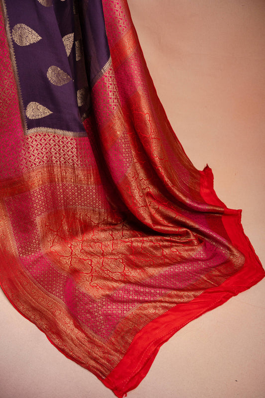 Purple Crepe Silk Saree with Pink-Red Contrast Border and Zari Buttas