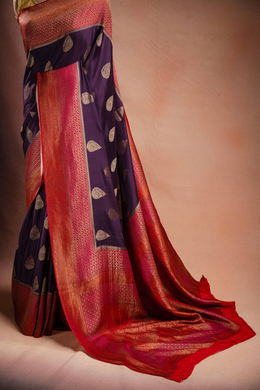 Purple Crepe Silk Saree with Pink-Red Contrast Border and Zari Buttas