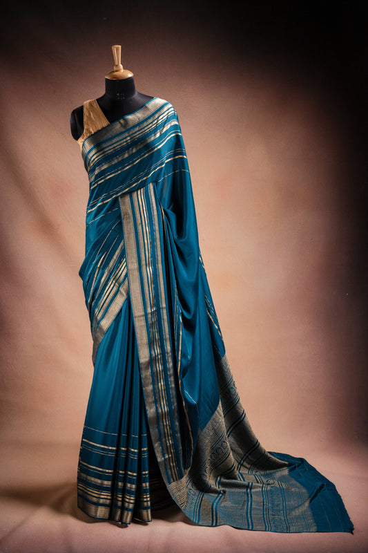 Blue Crepe Silk Saree with Zari Piping Border