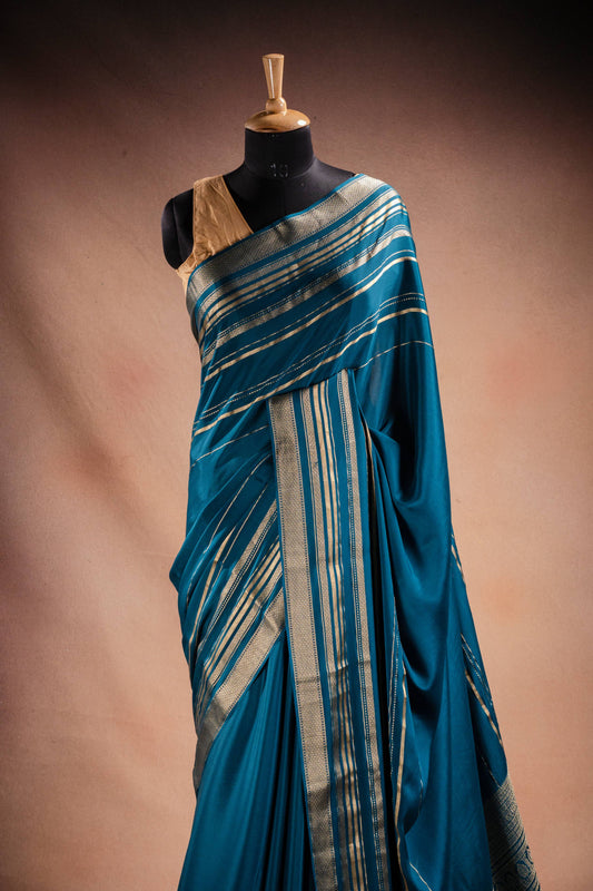 Blue Crepe Silk Saree with Zari Piping Border