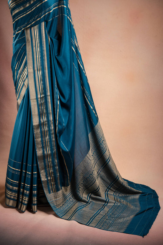Blue Crepe Silk Saree with Zari Piping Border