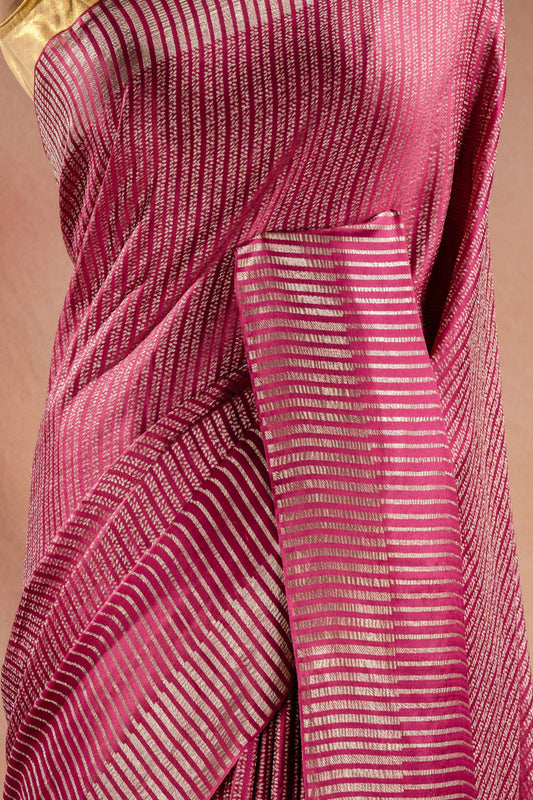 Pink Crepe Silk Saree with Zari Stripes showcasing elegant zari stripe weaving in a vibrant pink color.