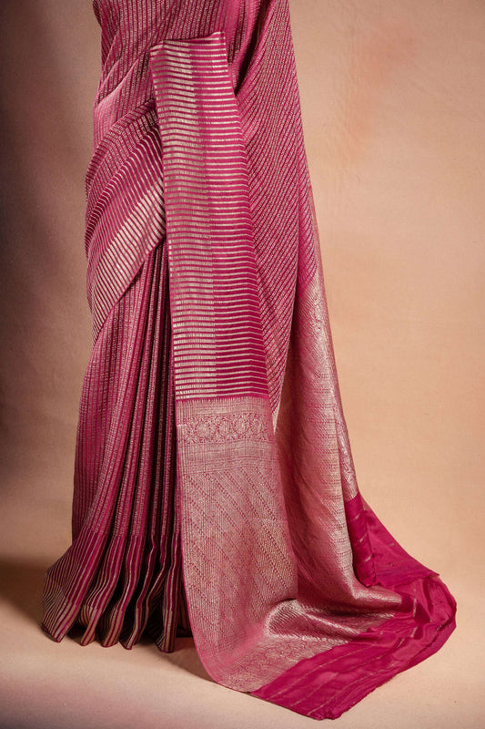 Pink Crepe Silk Saree with Zari Stripes showcasing elegant zari stripe weaving.