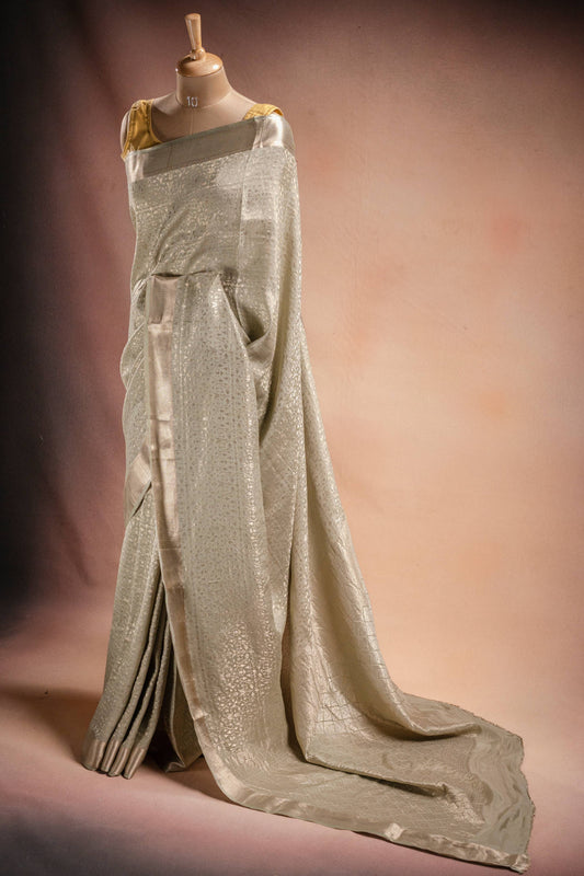 Beige Crepe Silk Saree with All-Over Weave