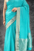 Teal Blue Crepe Saree with Silver Buttas & Floral Jaal Texture that-saree-shop.myshopify.com