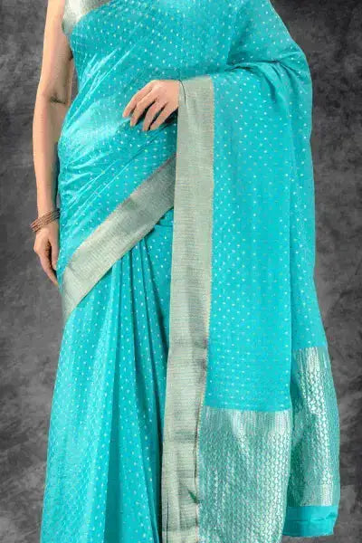 Teal Blue Crepe Saree with Silver Buttas & Floral Jaal Texture that-saree-shop.myshopify.com