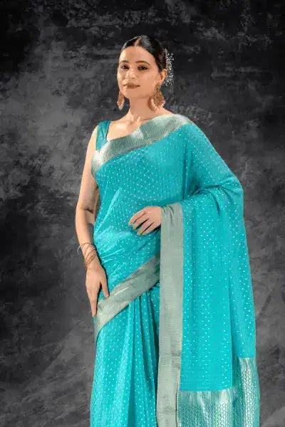 Teal Blue Crepe Saree with Silver Buttas & Floral Jaal Texture that-saree-shop.myshopify.com
