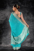 Teal Blue Crepe Saree with Silver Buttas & Floral Jaal Texture that-saree-shop.myshopify.com