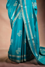 Teal Blue Crepe Silk Saree with Double Mispick Zari Roses that-saree-shop.myshopify.com